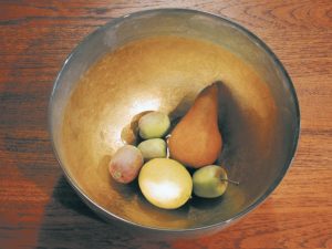 Human Being of Light photo of gold and silver bowl filled with fruit